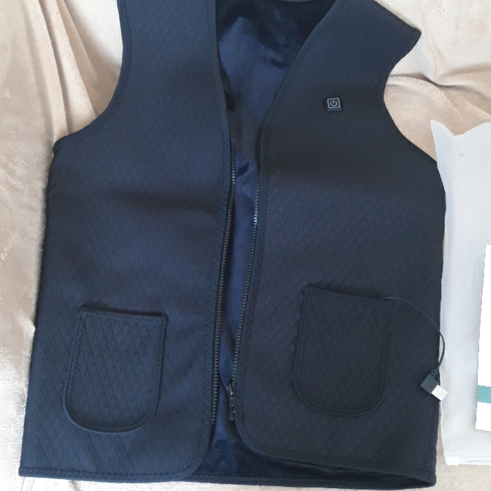 Heated multi use vest